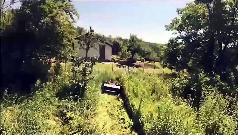 Drone-Captured Feedback from a European Customer: VTLM800 Mowing Dense Grass in an Orchard