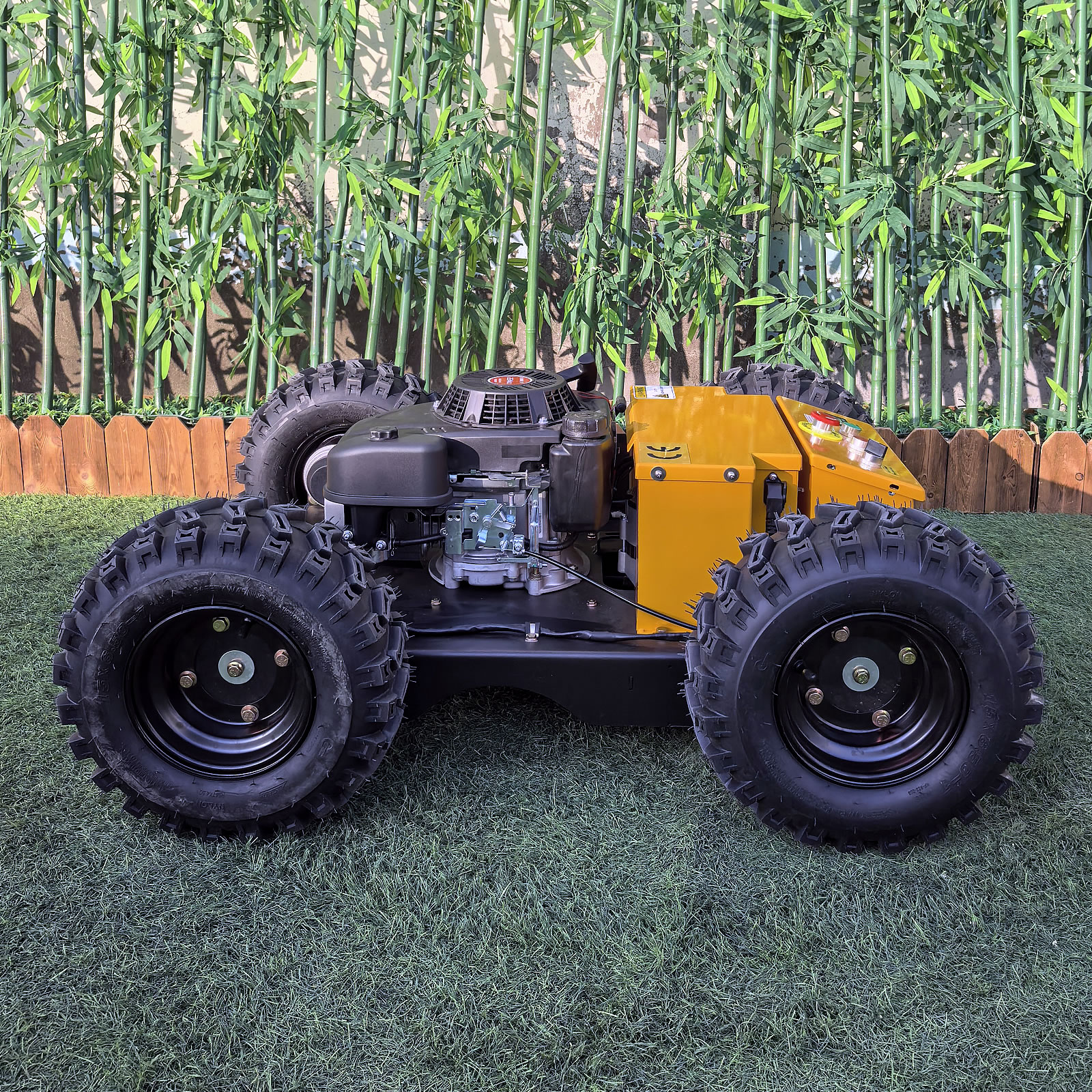 Yellow remote wheeled mower (VTW550-90) with brakes and vacuum tyres - Image 4